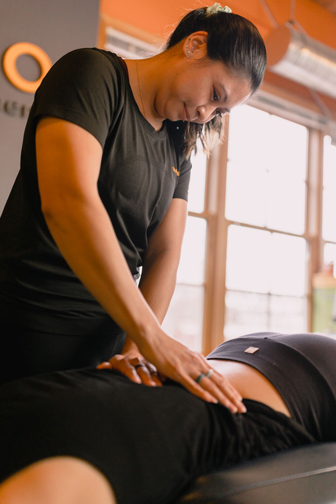 Seattle chiropractor Dr. Maya Shamsuddin treats a patient for back issues